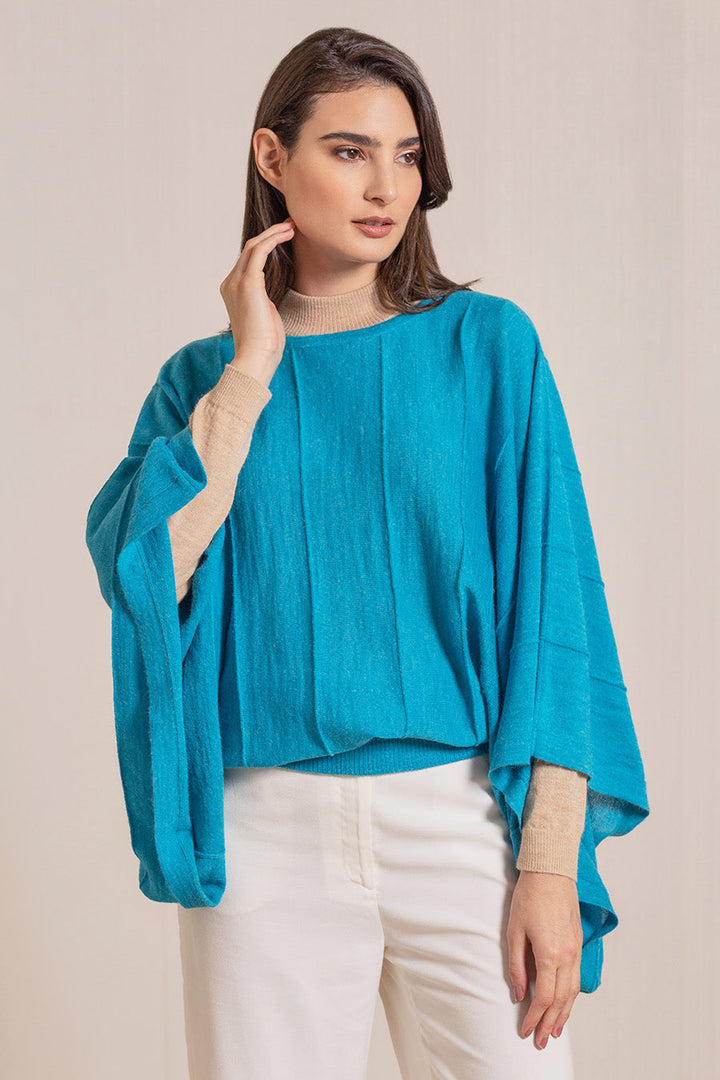 Poncho Vavi Baby Alpaca Color Piscina